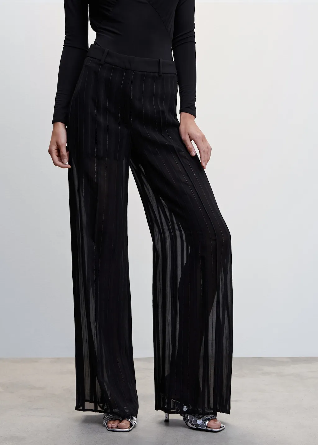 Pantaloni semitrasparenti gessati